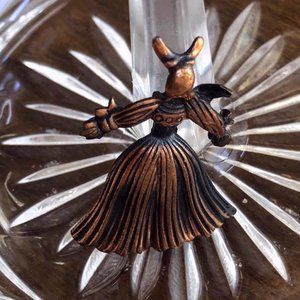 Copper corn husk doll brooch